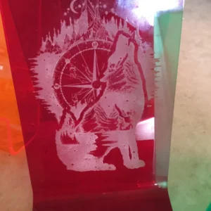 Laser engraved Red acrylic book and tablet stand- wolf