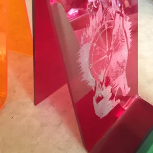 Laser engraved acrylic book and tablet stand with close up