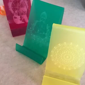 Laser engraved acrylic book and tablet stands