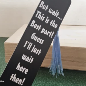 Black inspirational bookmark with blue tassel – “But wait… this is the best part!”