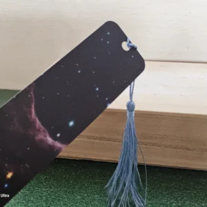 Cosmic galaxy design bookmark with blue tassel