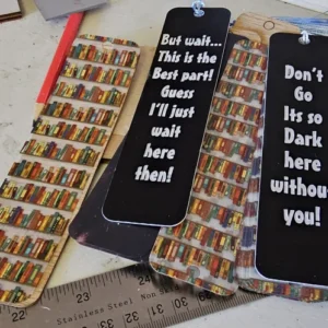 Collection of custom engraved and printed bookmarks with tassels